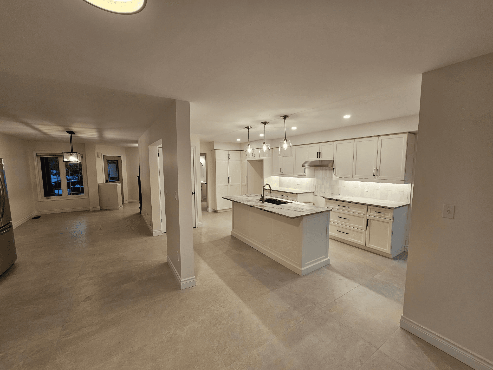 Kitchen and living room after